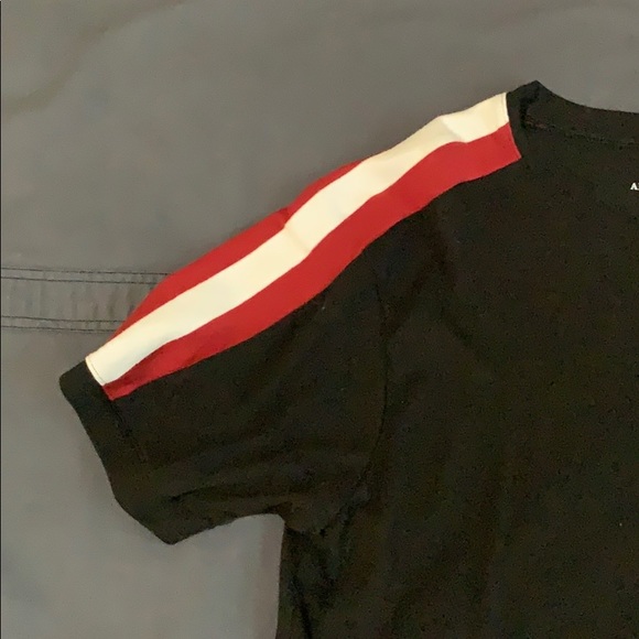 black with white and red striped shirt - Picture 2 of 4